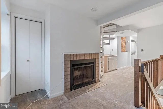 a view of a livingroom with a fireplace