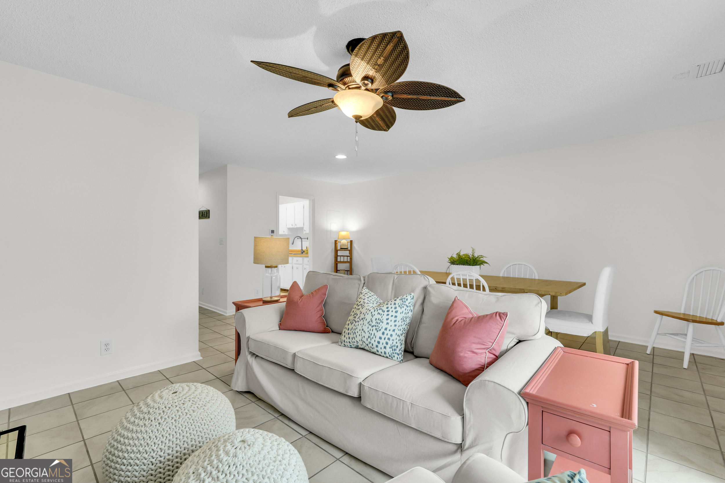 114 South Island Square Drive St. Simons, GA 31522 - Photo 20 of 51 a living room with furniture and a ceiling fan