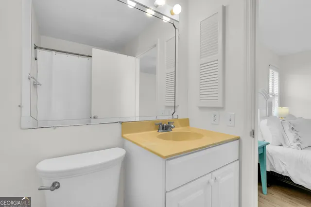 a bathroom with a sink and a toilet