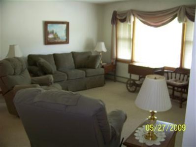 8806 Liable Road Highland, IN 46322 - Photo 2 of 10 a living room with furniture and a window