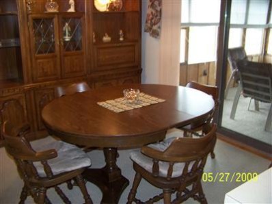 8806 Liable Road Highland, IN 46322 - Photo 7 of 10 a view of a dining room with furniture and wooden floor
