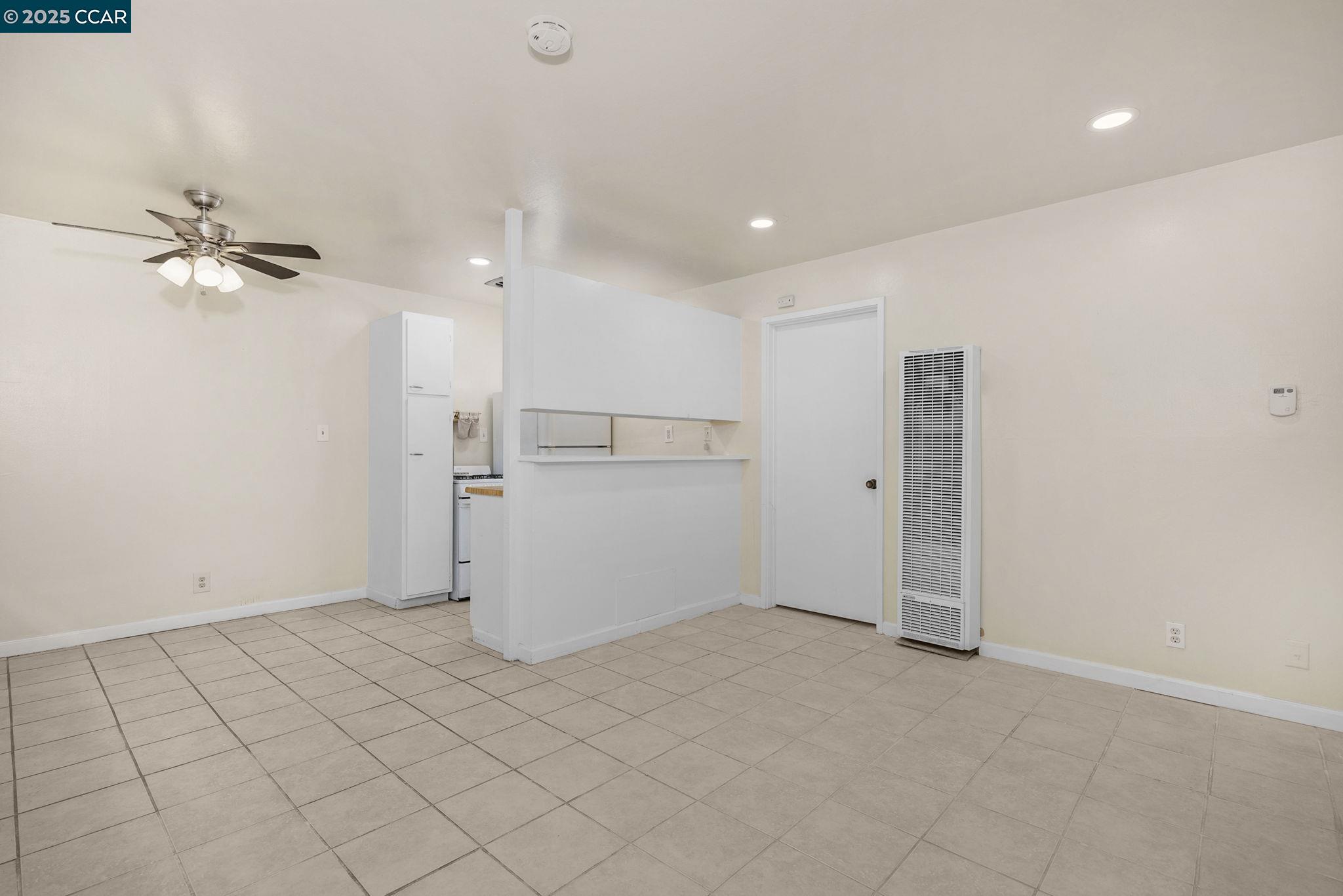 1926 Alcatraz Avenue, Unit 2 Berkeley, CA 94703 - Photo 7 of 13 wooden floor in an empty room