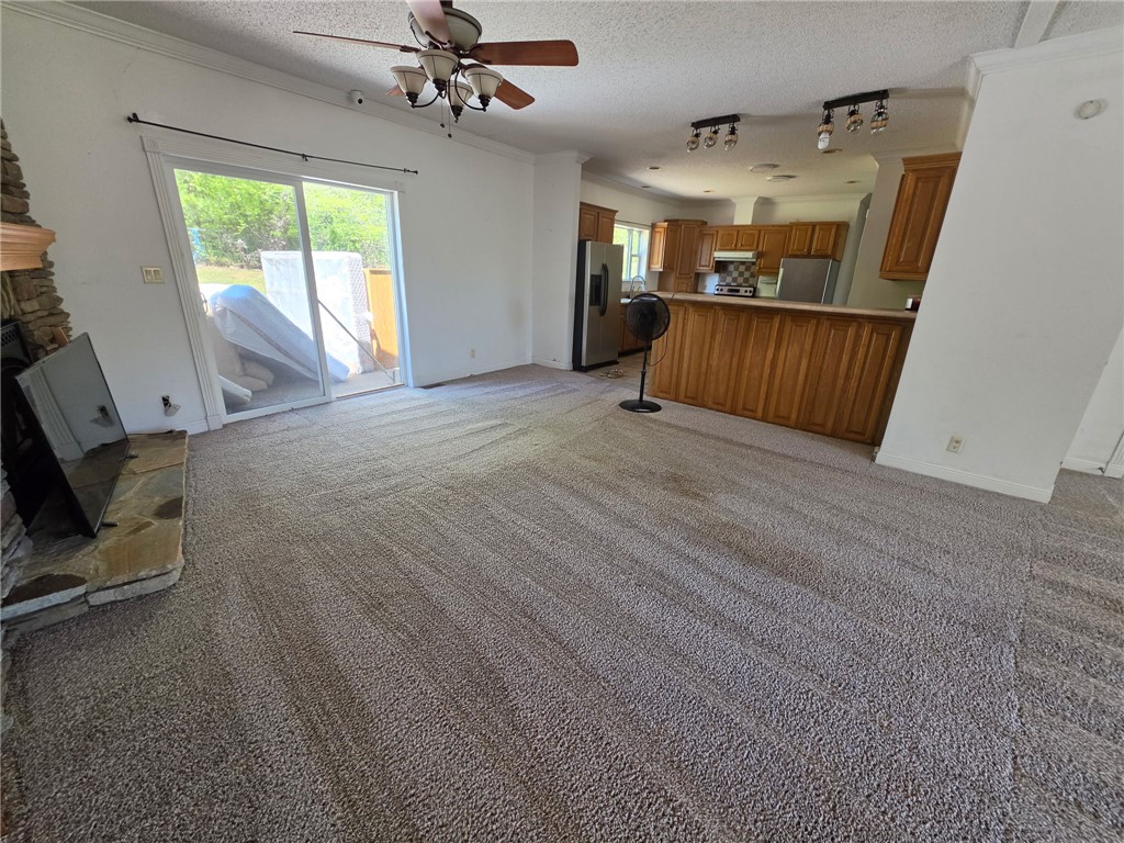 1400 Massey Road Pendleton, SC 29670 - Photo 5 of 25 This inviting space combines a cozy living area with an open-concept kitchen.
