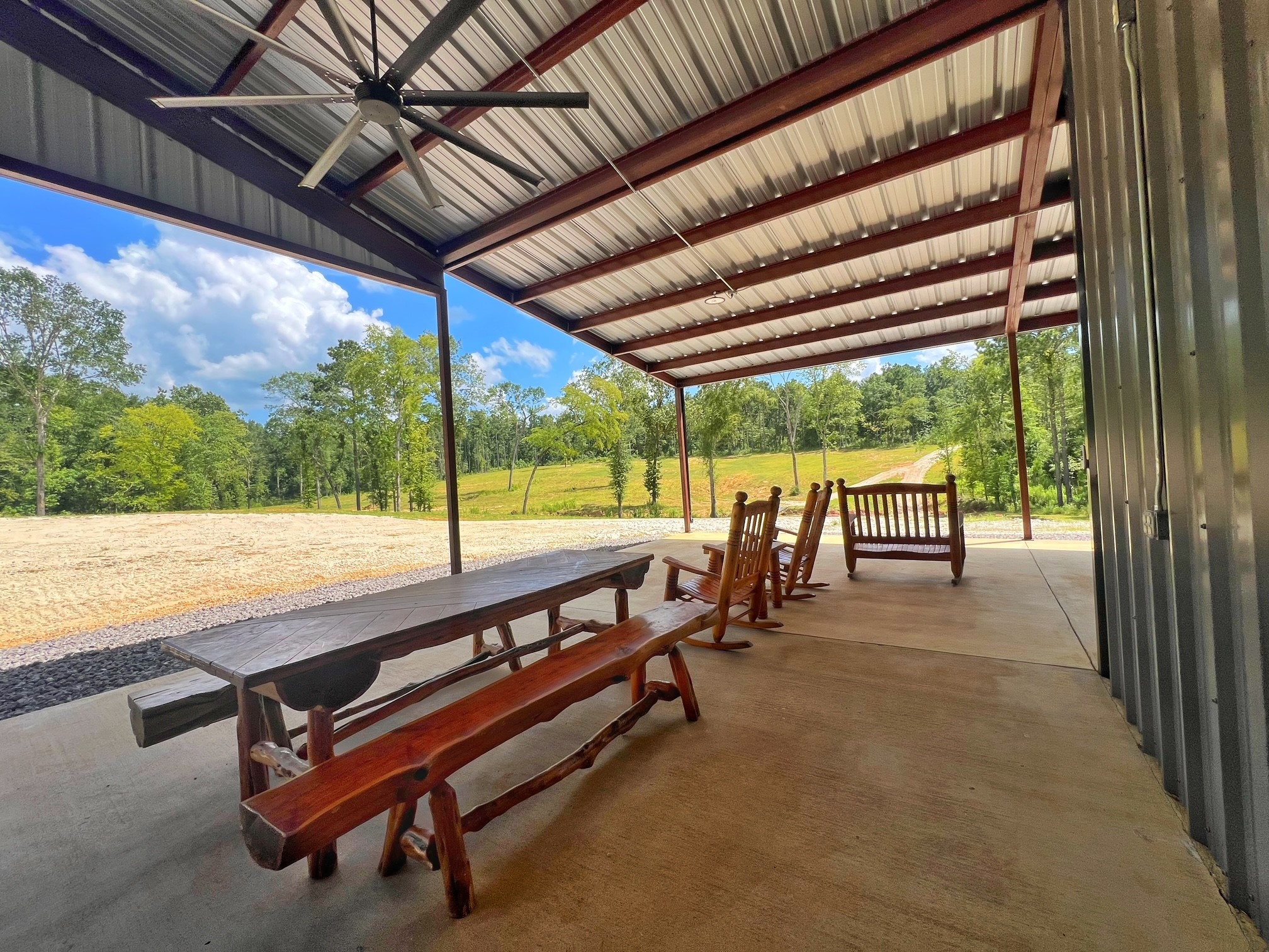1320 County Road 2112 Rusk, TX 75785 - Photo 40 of 50 a view of a chairs and table in the patio