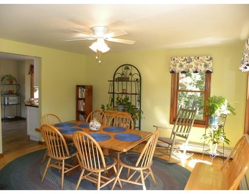 30 Wamsutta Ridge Road Charlton, MA 01507 - Photo 15 of 42 a view of a dining room with furniture and chandelier