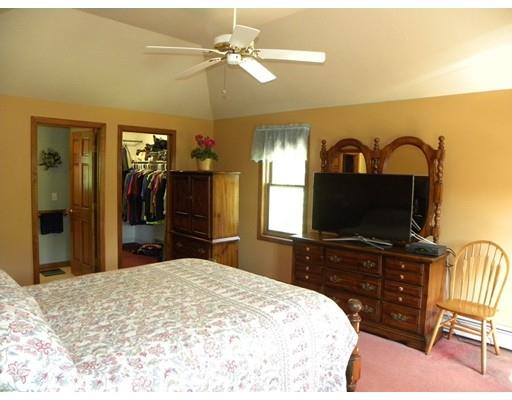 30 Wamsutta Ridge Road Charlton, MA 01507 - Photo 18 of 42 a bedroom with a bed and a flat screen tv