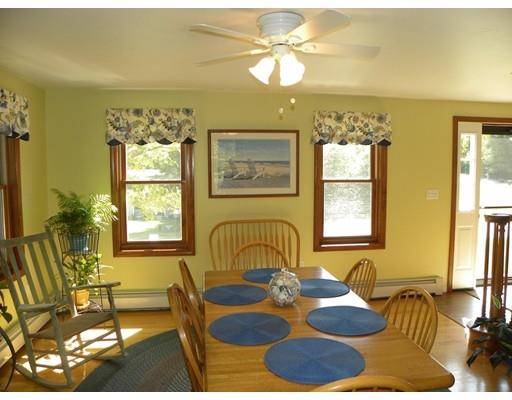 30 Wamsutta Ridge Road Charlton, MA 01507 - Photo 20 of 42 a table with a couch and chandelier