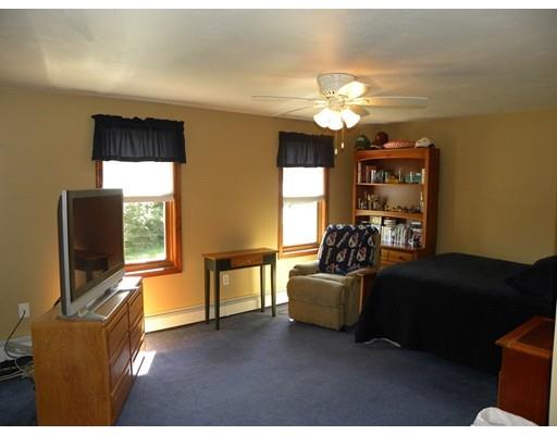 30 Wamsutta Ridge Road Charlton, MA 01507 - Photo 24 of 42 a living room with furniture and a flat screen tv