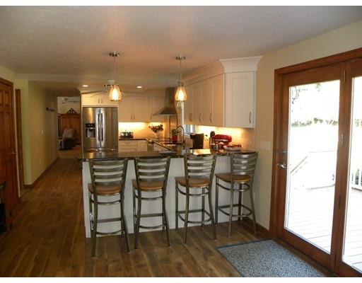 30 Wamsutta Ridge Road Charlton, MA 01507 - Photo 3 of 42 a kitchen with a table and chairs in it