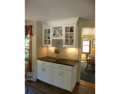 30 Wamsutta Ridge Road Charlton, MA 01507 - Photo 33 of 42 a kitchen with stainless steel appliances granite countertop a sink and cabinets