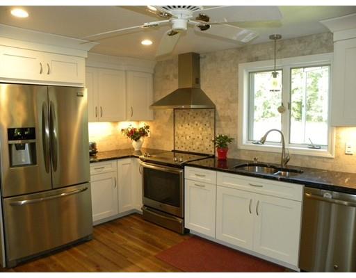 30 Wamsutta Ridge Road Charlton, MA 01507 - Photo 34 of 42 a kitchen with granite countertop a sink stainless steel appliances and cabinets
