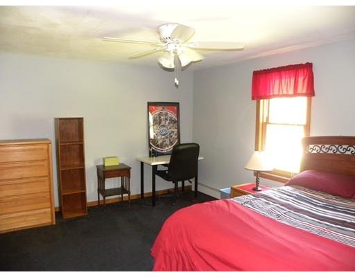 30 Wamsutta Ridge Road Charlton, MA 01507 - Photo 35 of 42 a bedroom with a bed dresser and a window