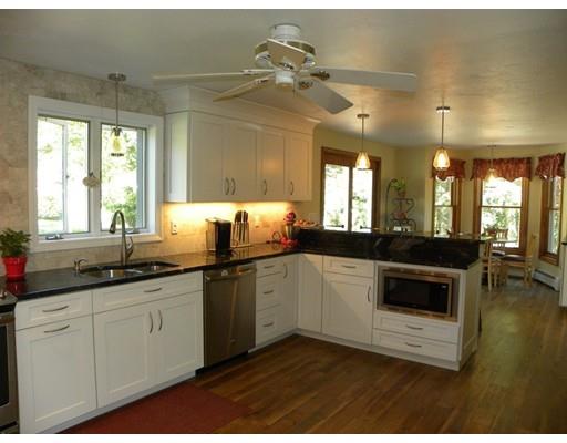 30 Wamsutta Ridge Road Charlton, MA 01507 - Photo 4 of 42 a kitchen with a sink and cabinets