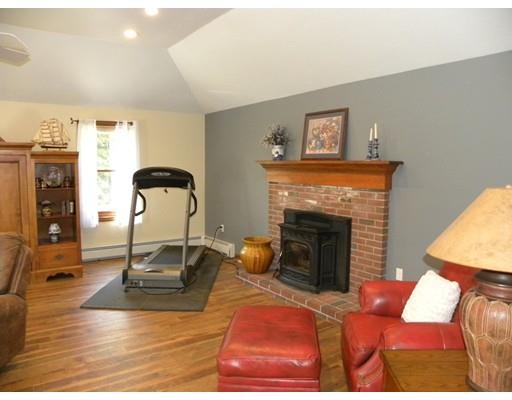 30 Wamsutta Ridge Road Charlton, MA 01507 - Photo 5 of 42 a living room with furniture and a fireplace
