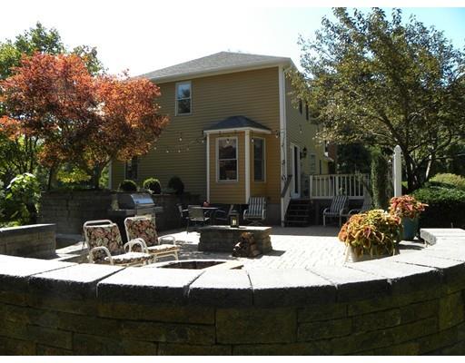 30 Wamsutta Ridge Road Charlton, MA 01507 - Photo 10 of 42 a view of house with yard outdoor seating and covered with trees