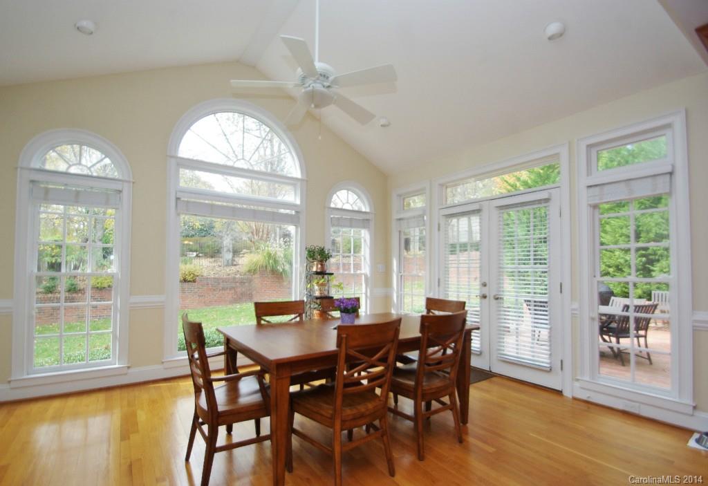 1640 Windy Ridge Road Charlotte, NC 28270 - Photo 12 of 22 a view of a dining room with furniture window and wooden floor