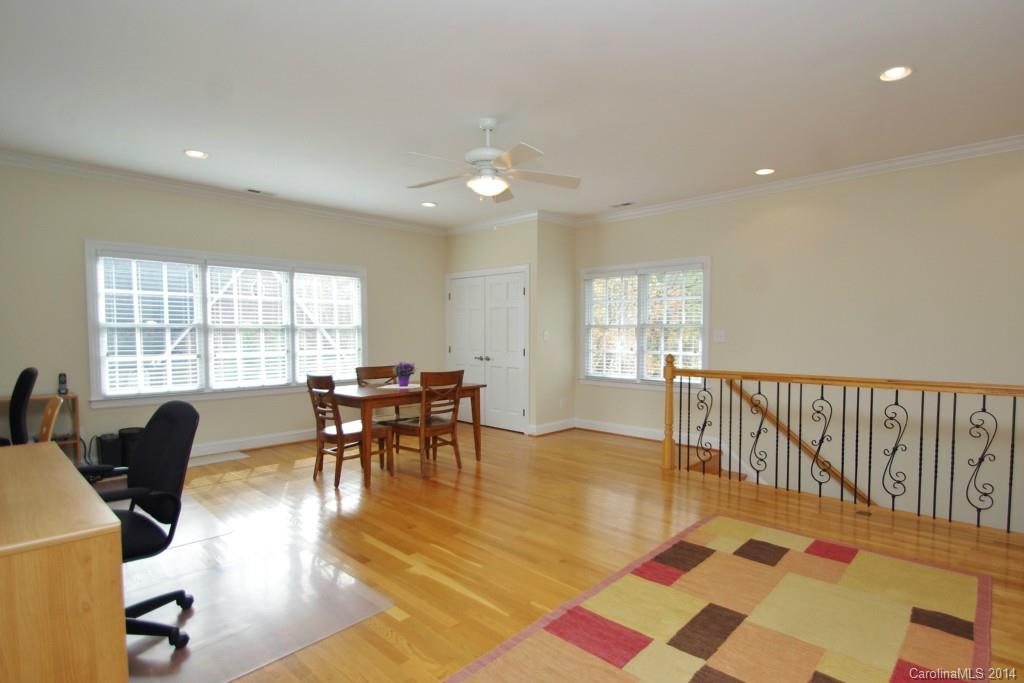 1640 Windy Ridge Road Charlotte, NC 28270 - Photo 19 of 22 a view of a dining room with furniture and a table