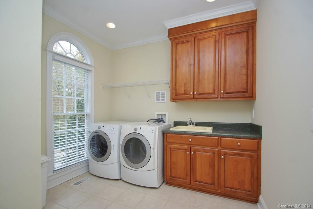 1640 Windy Ridge Road Charlotte, NC 28270 - Photo 20 of 22 a utility room with dryer and washer