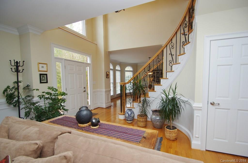 1640 Windy Ridge Road Charlotte, NC 28270 - Photo 3 of 22 a living room with furniture and flowers