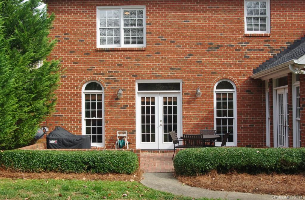 1640 Windy Ridge Road Charlotte, NC 28270 - Photo 21 of 22 a front view of a house with a yard
