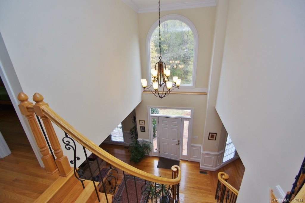 1640 Windy Ridge Road Charlotte, NC 28270 - Photo 4 of 22 a view of entryway and hall with wooden floor