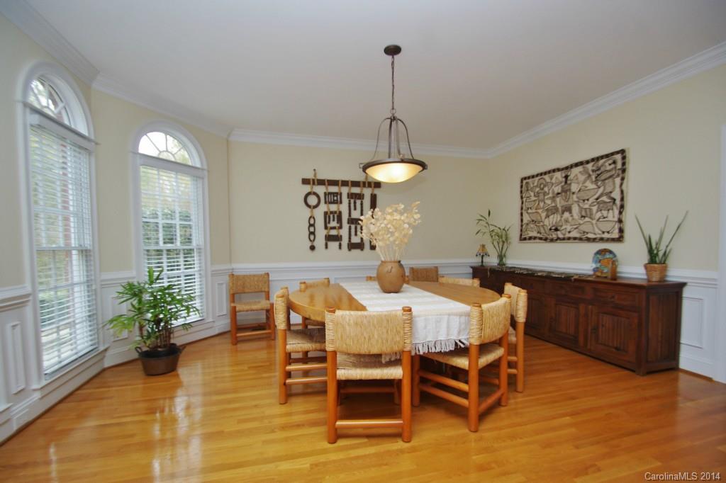 1640 Windy Ridge Road Charlotte, NC 28270 - Photo 6 of 22 a view of a dining room with furniture window and wooden floor