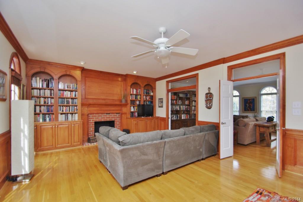 1640 Windy Ridge Road Charlotte, NC 28270 - Photo 7 of 22 a living room with furniture and a fireplace