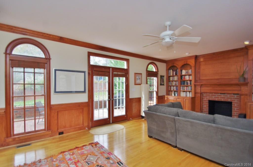 1640 Windy Ridge Road Charlotte, NC 28270 - Photo 9 of 22 a living room with furniture and a fireplace