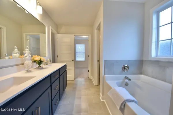$450,720 | 167 South Bandwheel Way, Hampstead, NC 28443