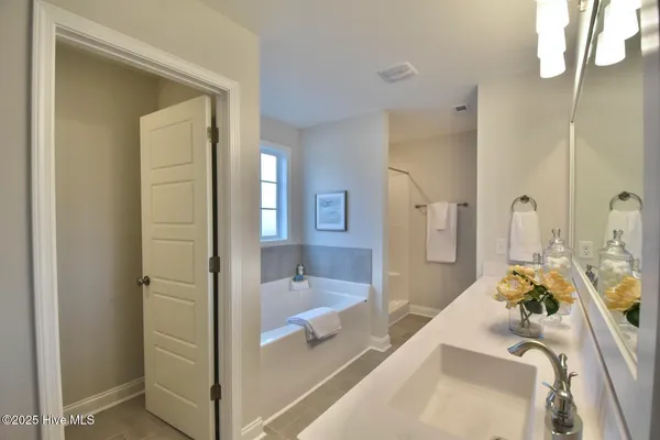$450,720 | 167 South Bandwheel Way, Hampstead, NC 28443