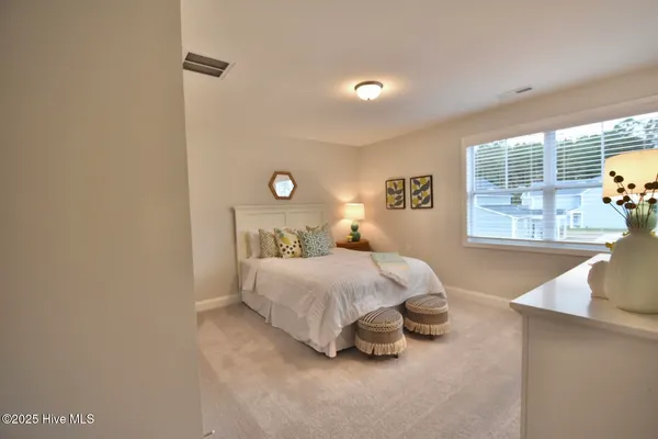 $450,720 | 167 South Bandwheel Way, Hampstead, NC 28443