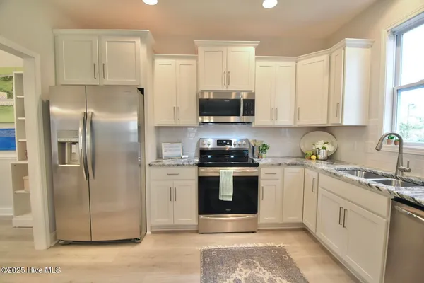 $450,720 | 167 South Bandwheel Way, Hampstead, NC 28443
