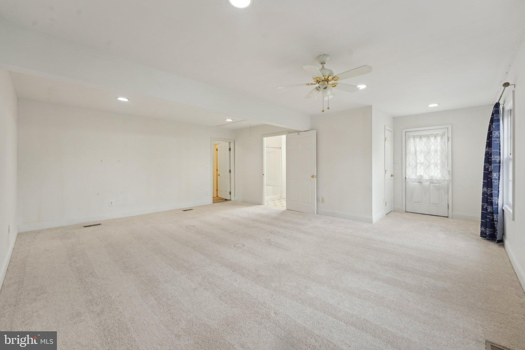 3026 Highley Road Eagleville, PA 19403 - Photo 22 of 46 an empty room with fan and a ceiling fan