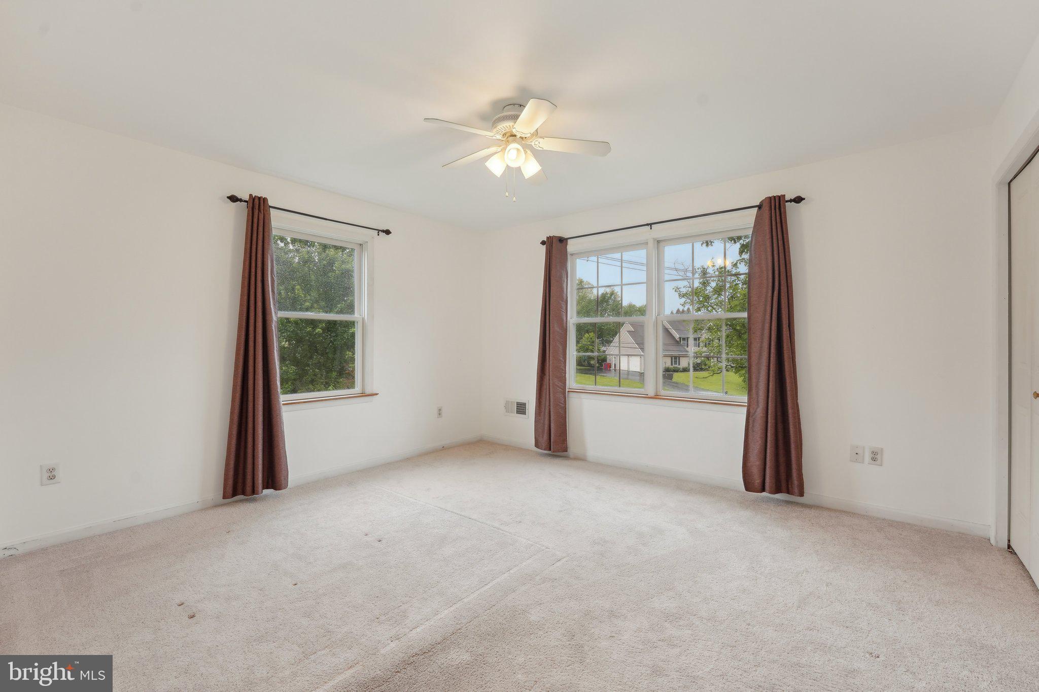 3026 Highley Road Eagleville, PA 19403 - Photo 29 of 46 a view of a livingroom with a ceiling fan and window