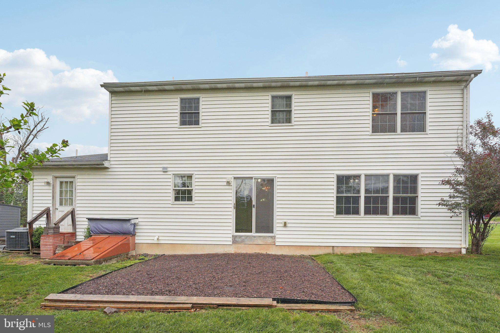 3026 Highley Road Eagleville, PA 19403 - Photo 40 of 46 a view of backyard of house with garage