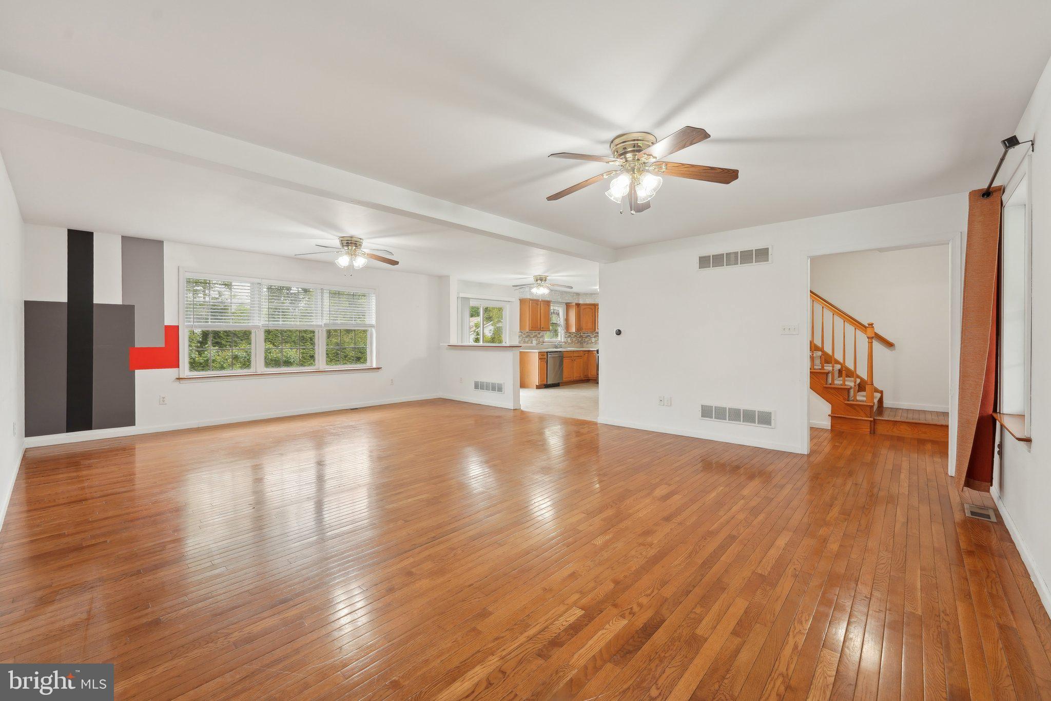 3026 Highley Road Eagleville, PA 19403 - Photo 8 of 46 a view of an empty room with wooden floor and a window
