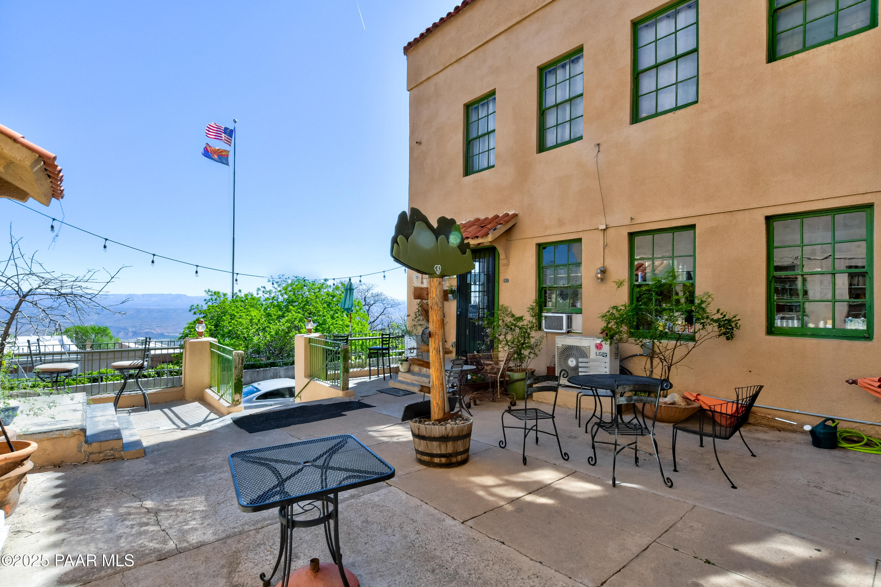 403 Clark Street Jerome, AZ 86331 - Photo 11 of 60 a view of a chairs and table in a patio