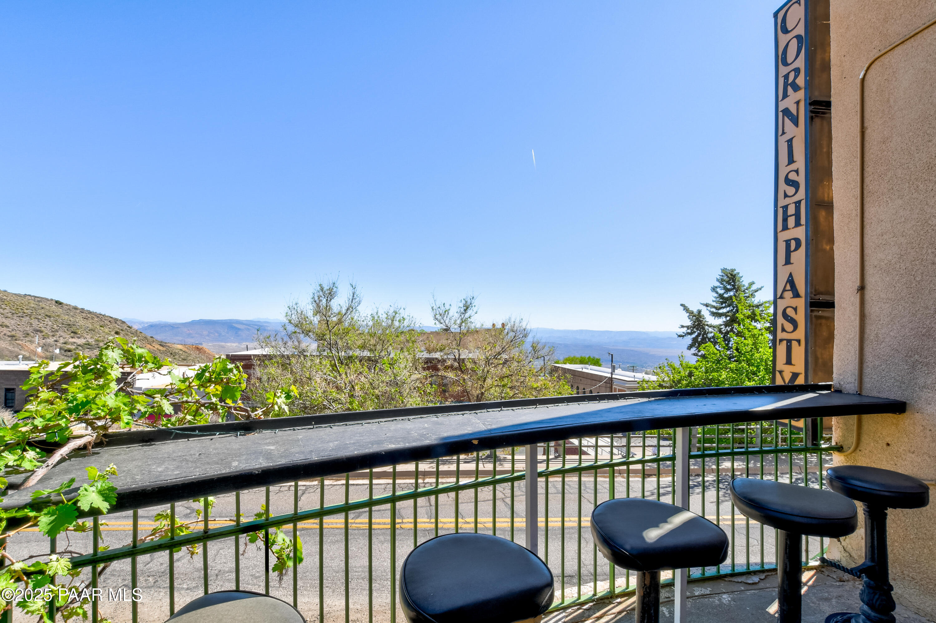403 Clark Street Jerome, AZ 86331 - Photo 13 of 60 a view of a chairs and table in patio