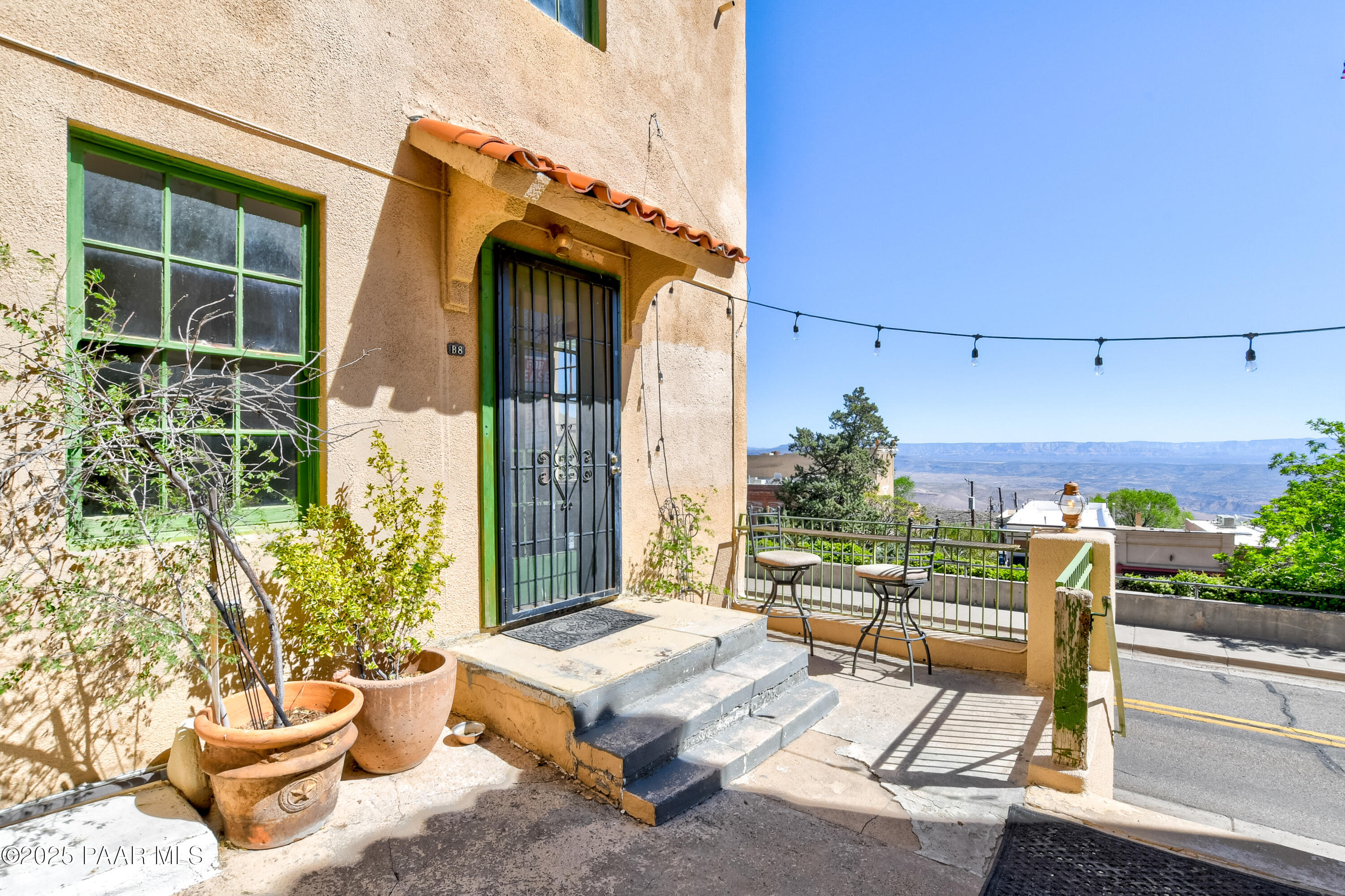 403 Clark Street Jerome, AZ 86331 - Photo 31 of 60 a front view of a house with outdoor seating