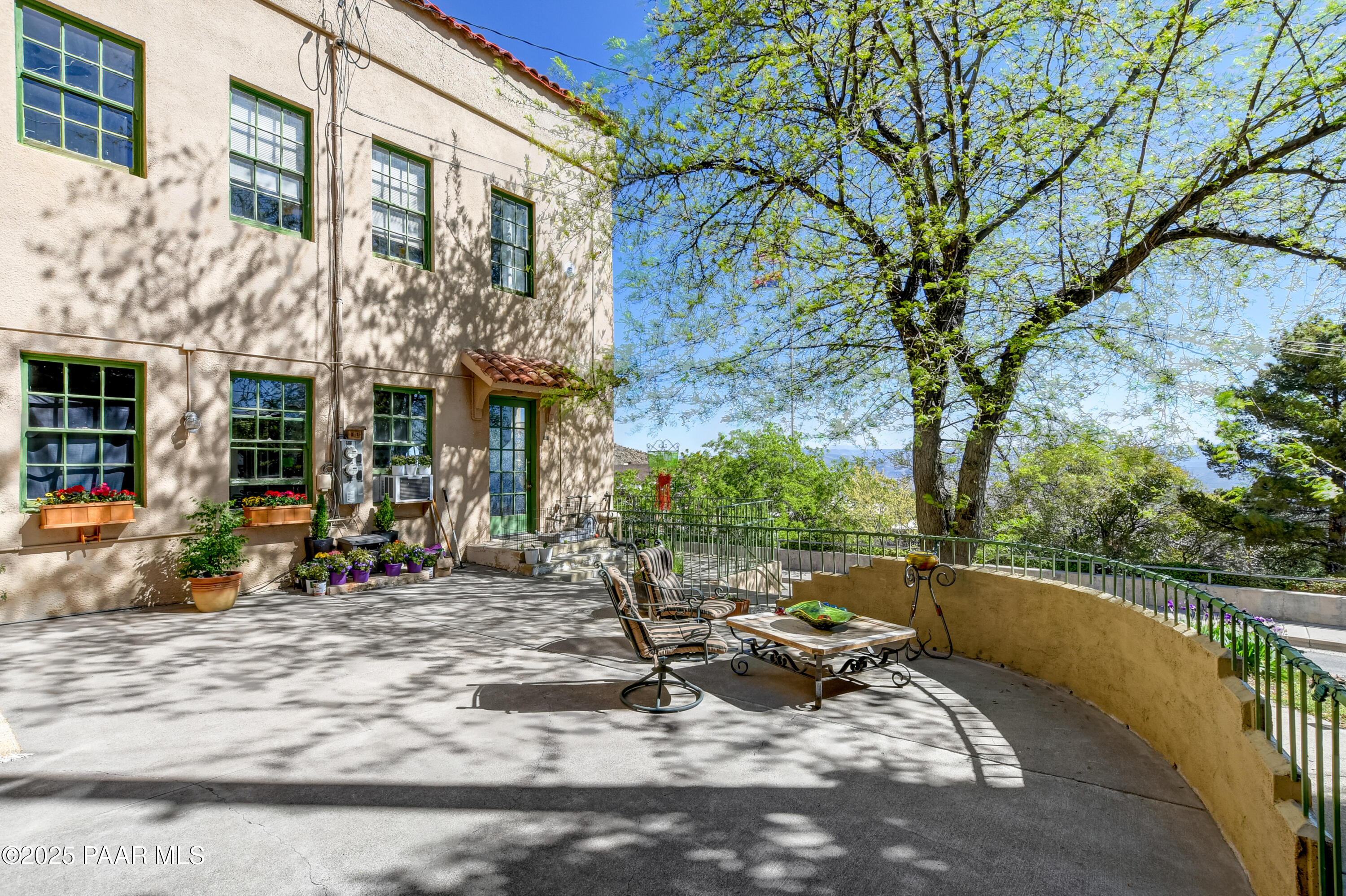 403 Clark Street Jerome, AZ 86331 - Photo 34 of 60 a view of a house with backyard sitting area and tub