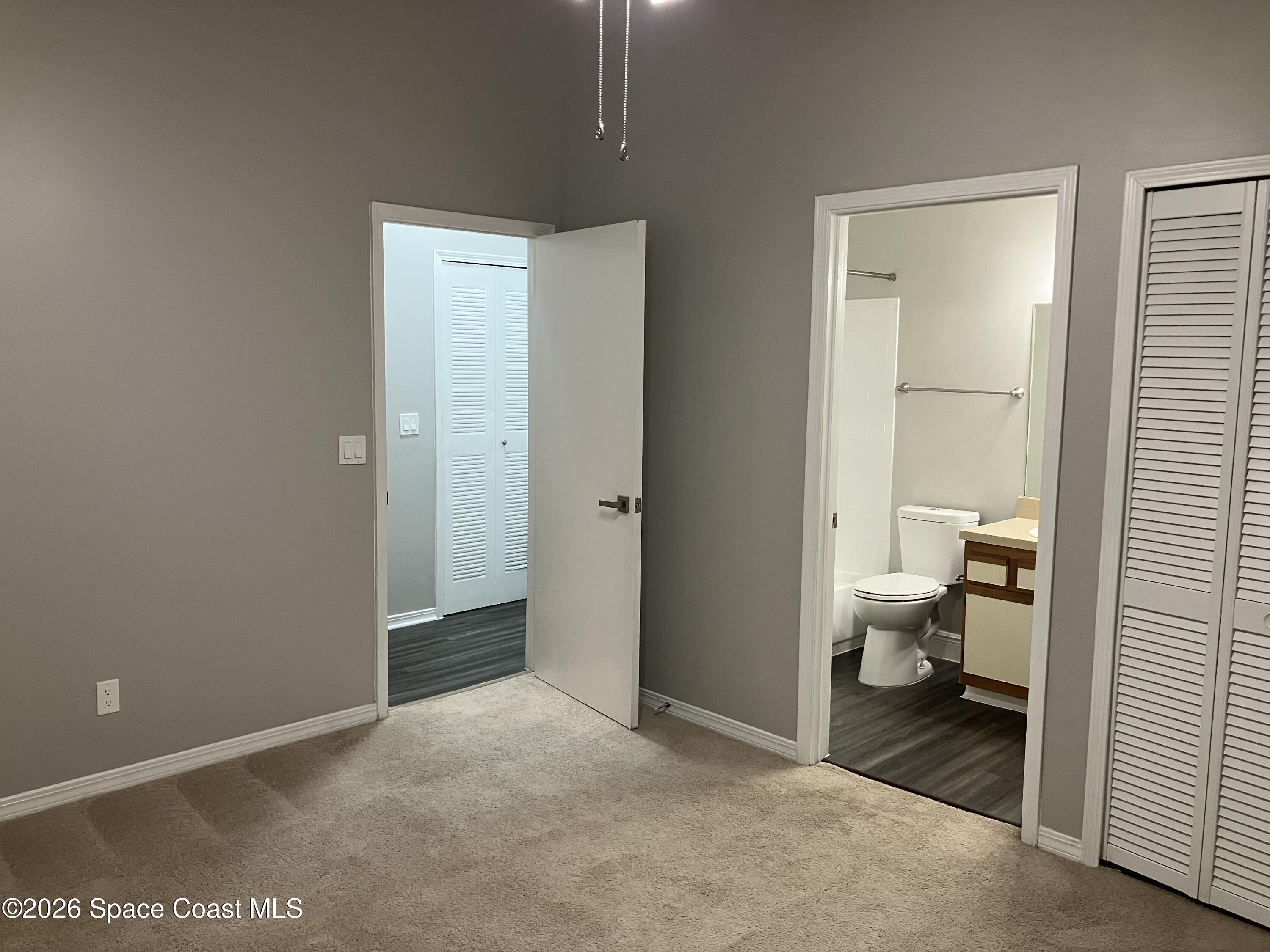 7667 North Wickham Road, Unit 1318 Melbourne, FL 32940 - Photo 9 of 18 a view of a bathroom with toilet