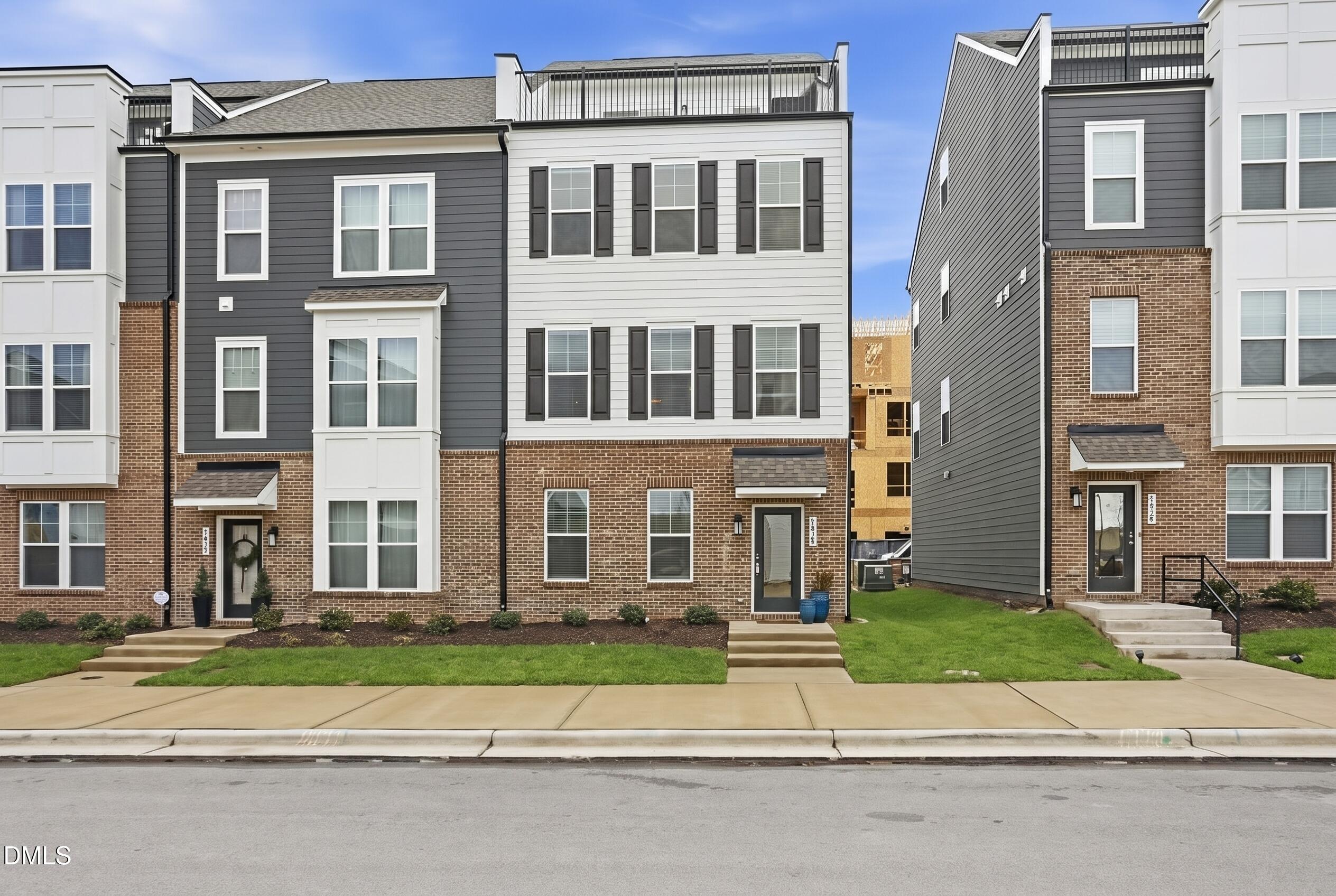 1434 Grove Village Road Wake Forest, NC 27587 - Photo 1 of 25 Welcome Home! Light abounds in this end-unit townhome