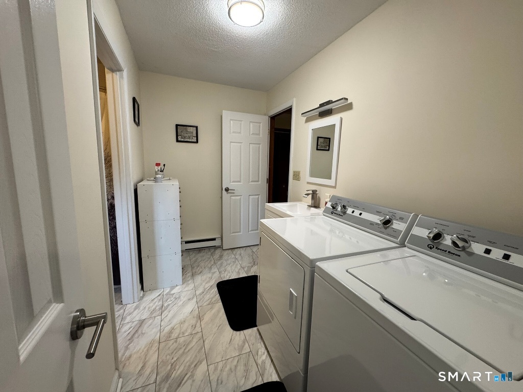 102 Potuccos Ring Road Wolcott, CT 06716 - Photo 21 of 26 Upper level washer and dryer