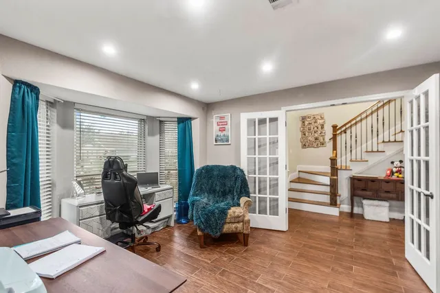 a livingroom with furniture and a window