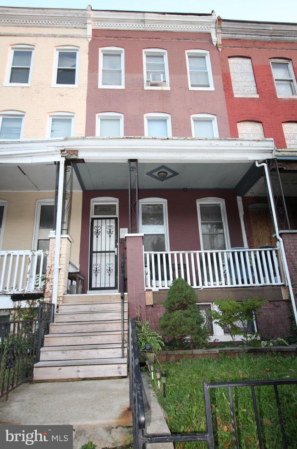 2425 West North Avenue Baltimore, MD 21216 - Photo 1 of 7 a front view of a house