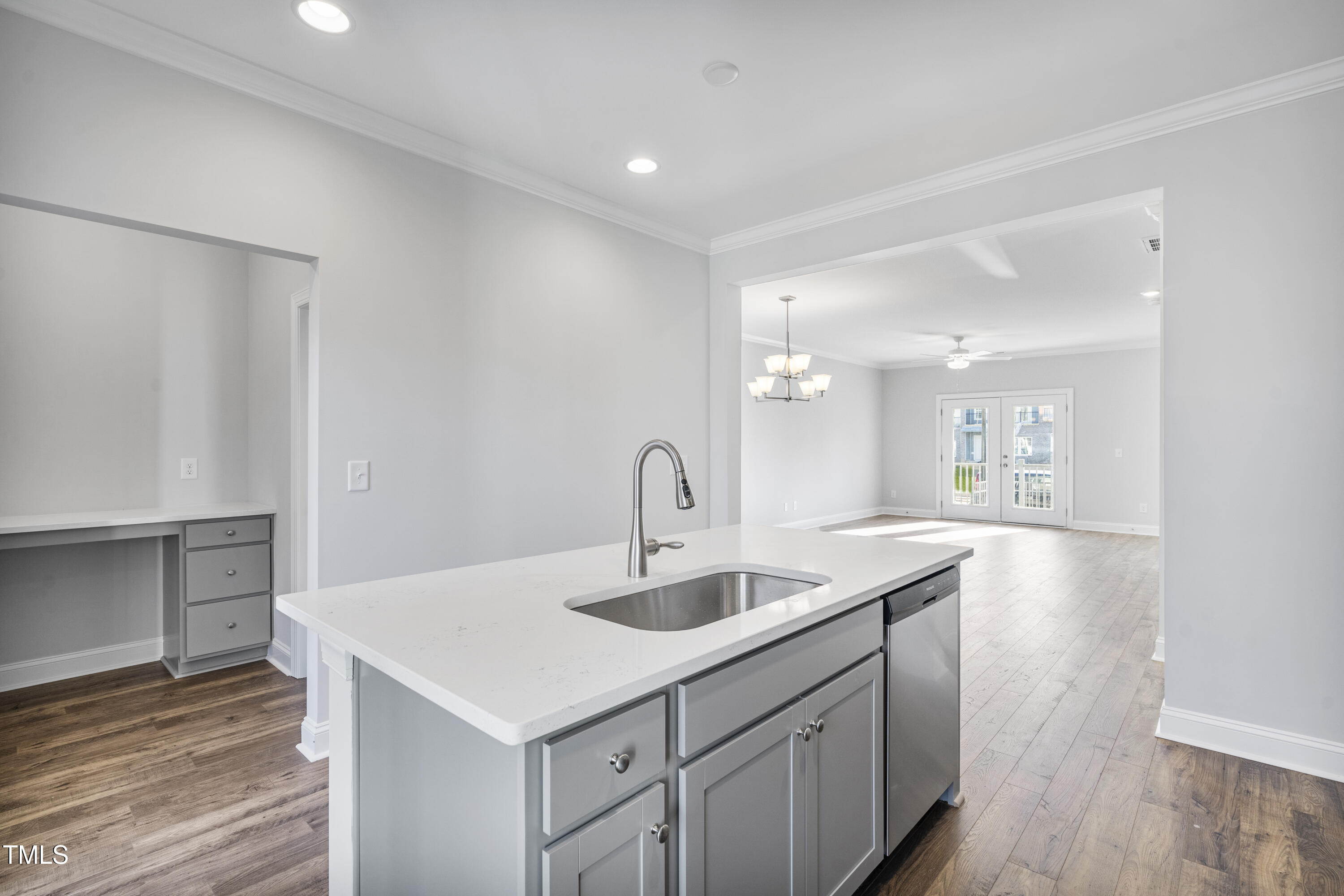 541 Forestville Road Wake Forest, NC 27587 - Photo 35 of 47 a kitchen with a sink cabinets and wooden floor
