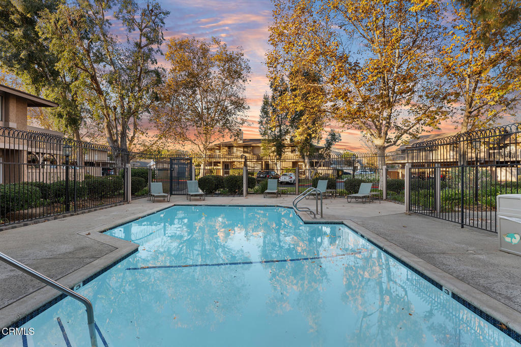 4448 Lubbock Drive, Unit C Simi Valley, CA 93063 - Photo 23 of 27 a view of a swimming pool with a patio
