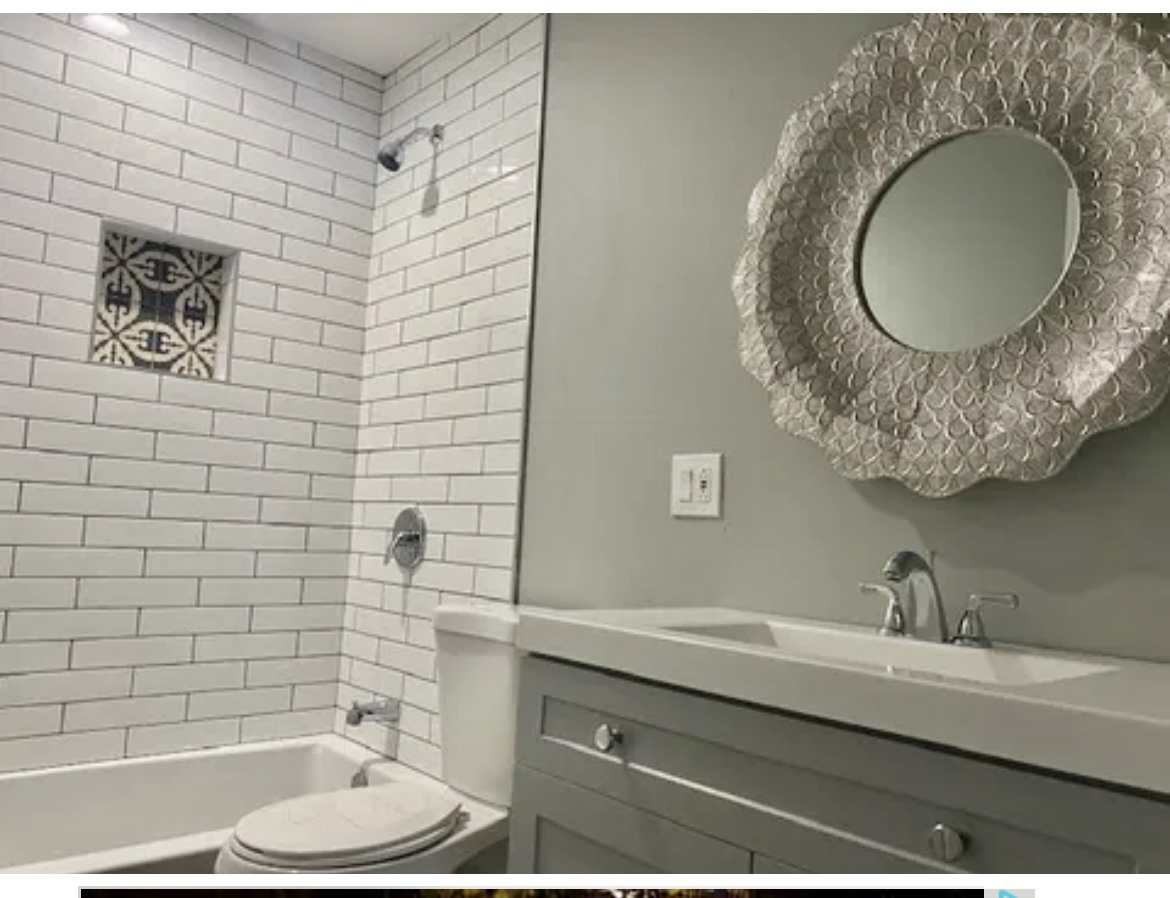 746 Walnut Street, Unit 2E Waukegan, IL 60085 - Photo 16 of 21 a bathroom with a granite countertop sink a mirror and a toilet