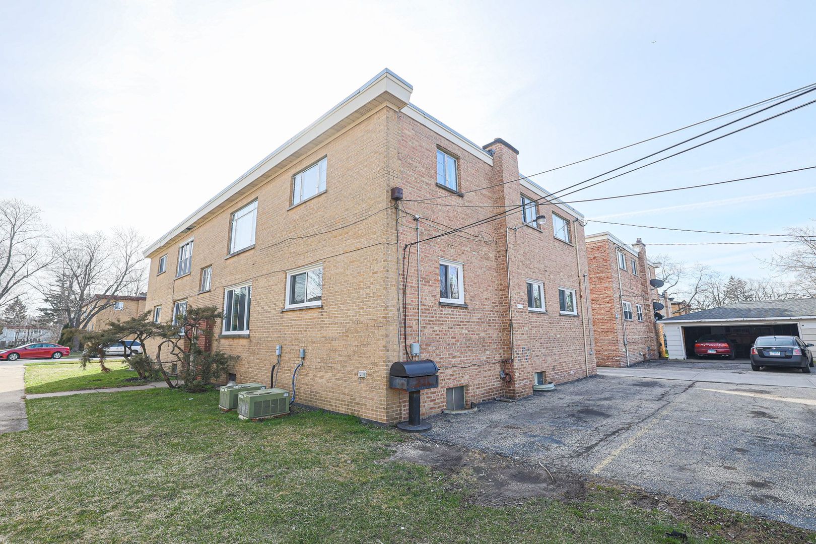746 Walnut Street, Unit 2E Waukegan, IL 60085 - Photo 21 of 21 a view of a house with a yard