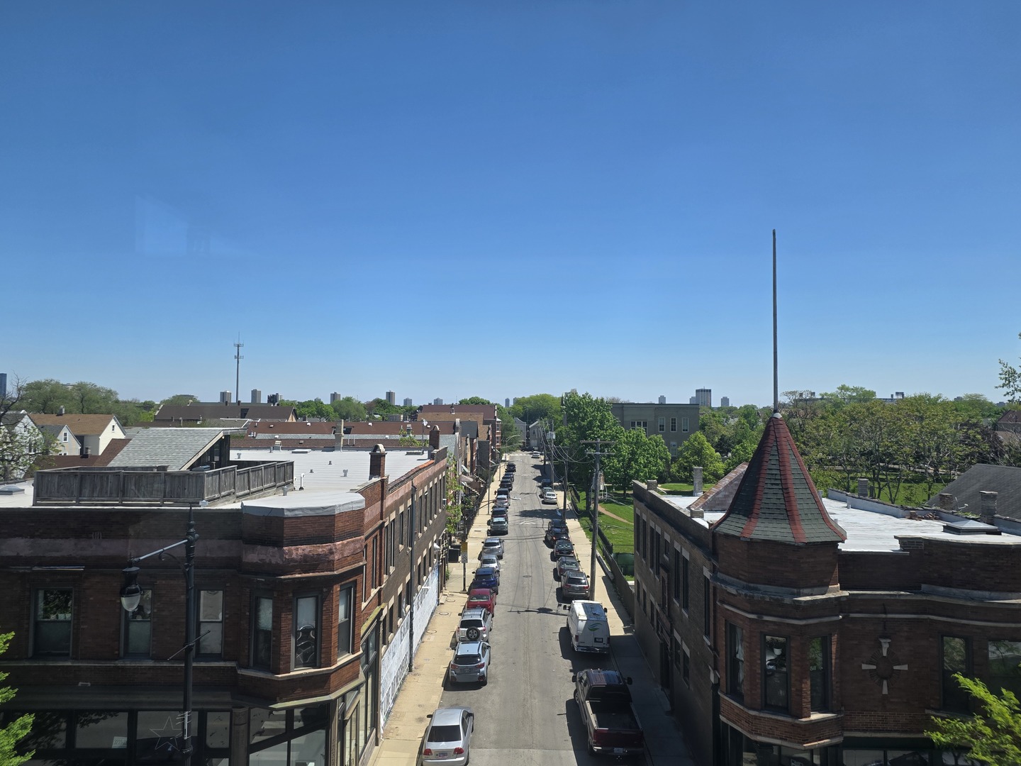 3216 South Morgan Street, Unit 3F Chicago, IL 60608 - Photo 5 of 6 a view of a city from a roof deck
